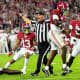 Alabama Crimson Tide defensive back DeMarcco Hellams (2) reacts after breaking up a fourth down pass attempt against Mississippi State Bulldogs wide receiver Jaden Walley (11) during the first half at Bryant-Denny Stadium.